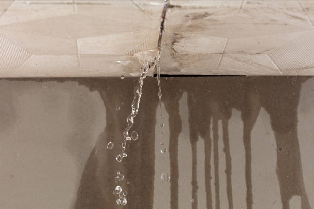 Professional Flood Damage Cleanup technician working in Armonk, NY